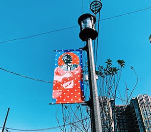 https://www.deepellumtexas.com/wp-content/uploads/Deep  Ellum  Street  Light Pole  Banners