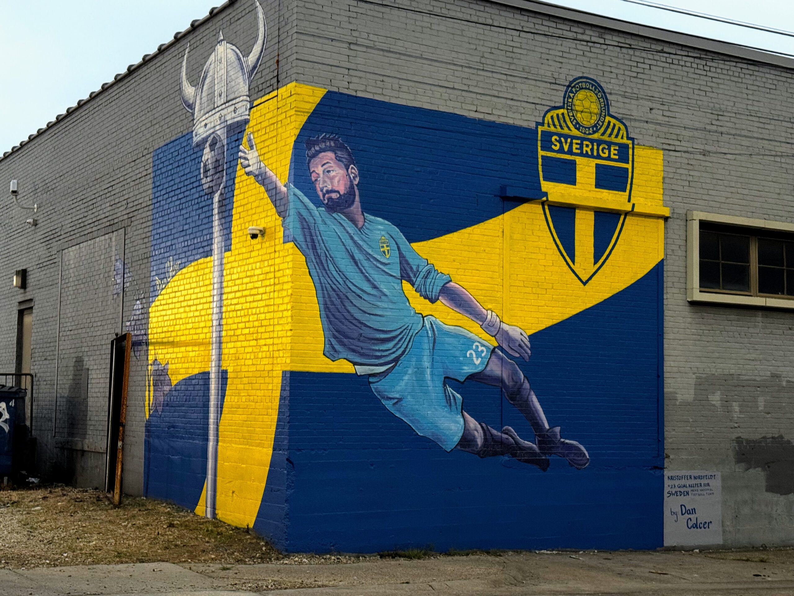 Sweden mural by Dan Colcer in Deep Ellum